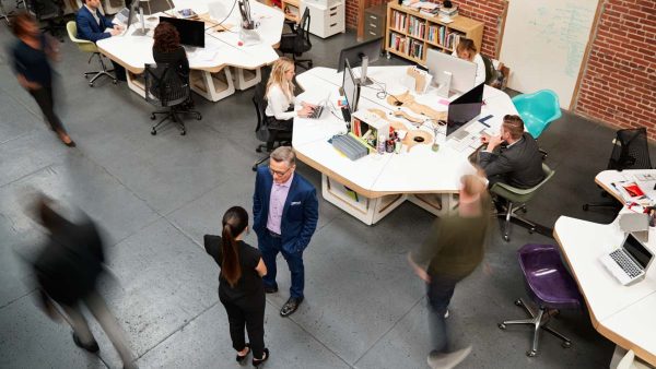 Overhead View Of Busy Modern Open Plan Office